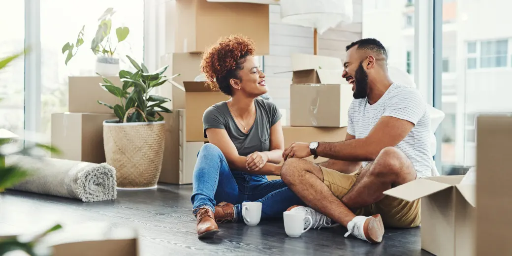 Couple unboxing after moving in