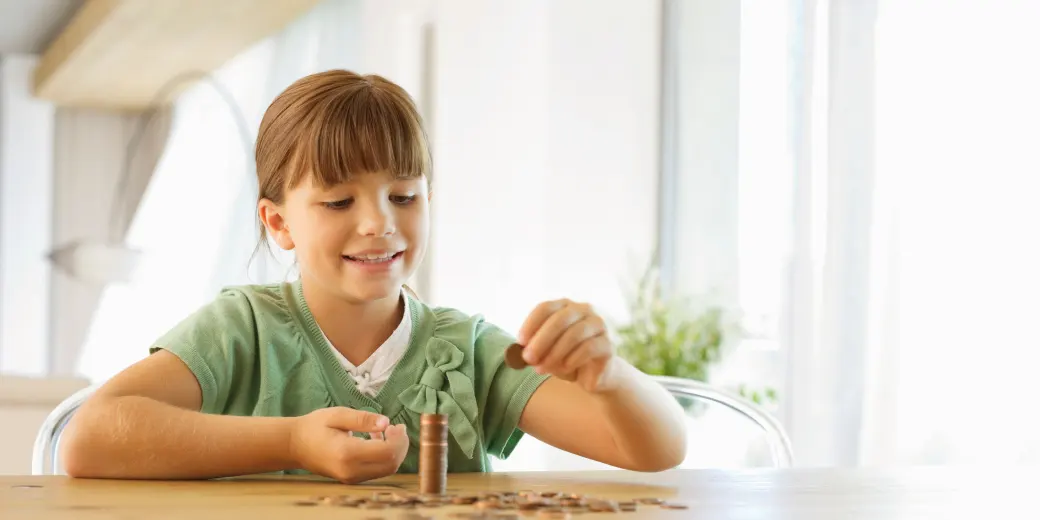 Young boy counting money
